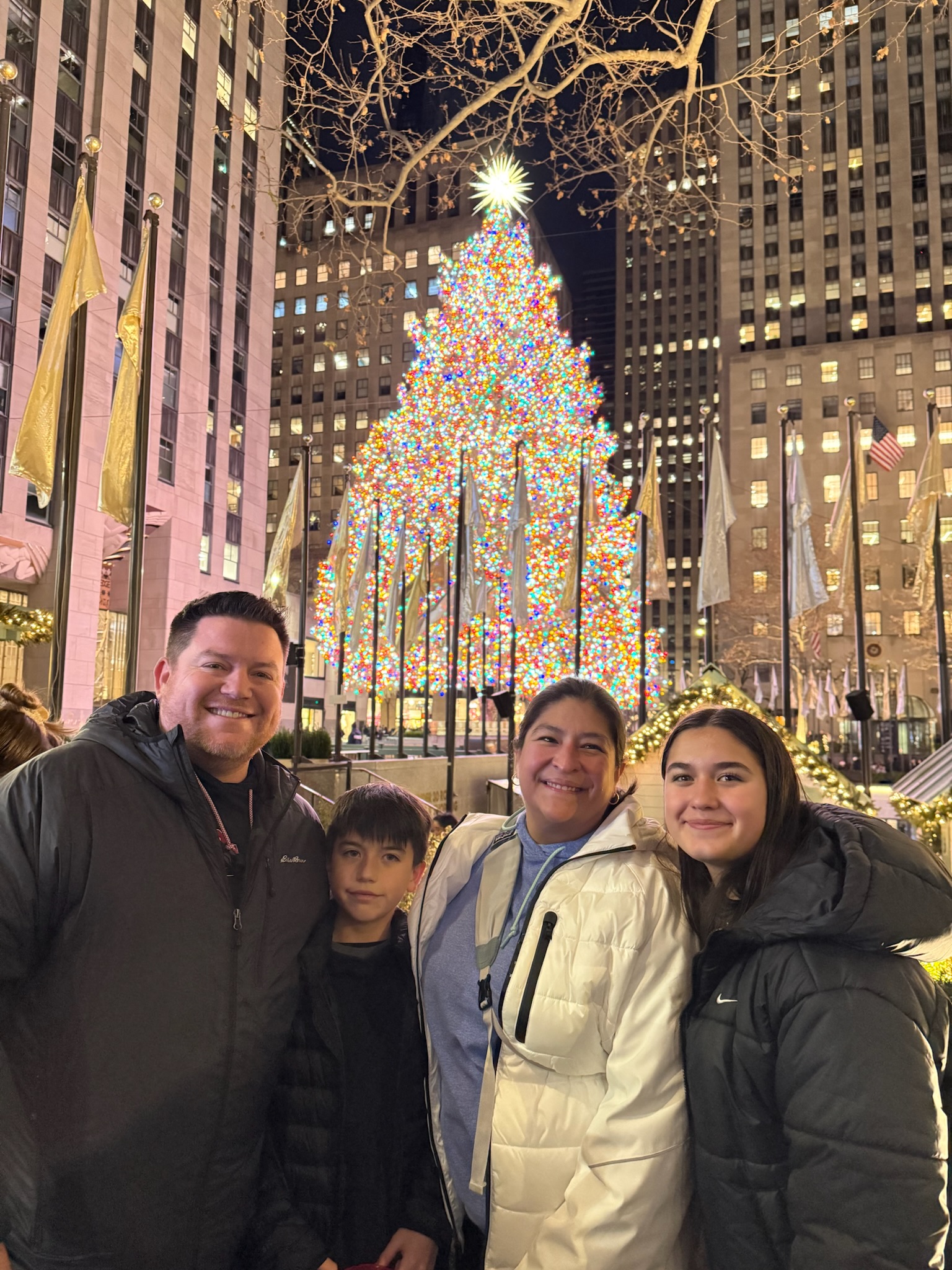 My family and me in front of the Rockefeller Center Christmas tree